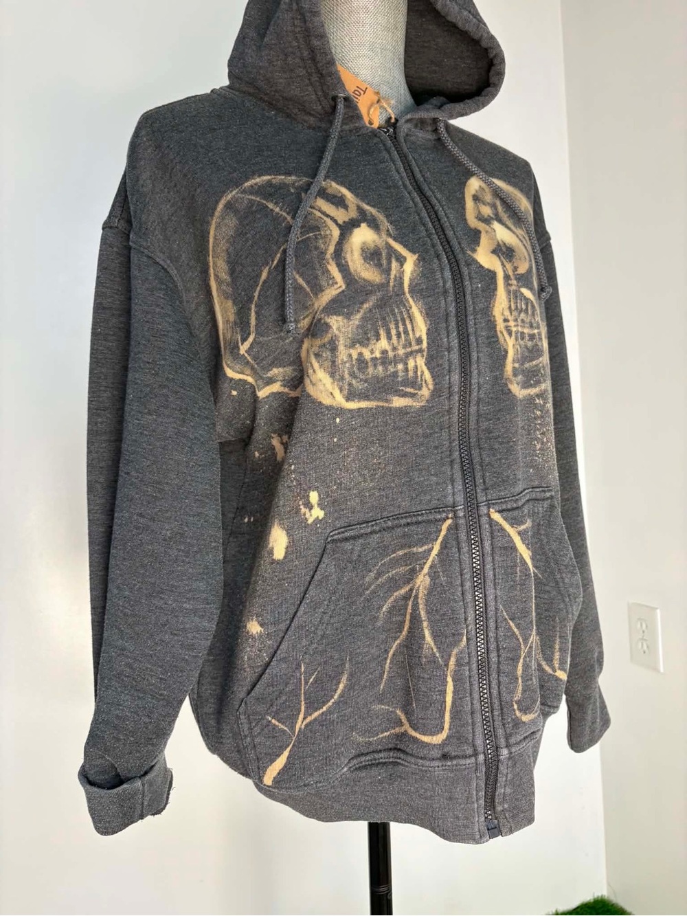 Charcoal Gray Zip-Up Hoodie with Bleached Skull Design